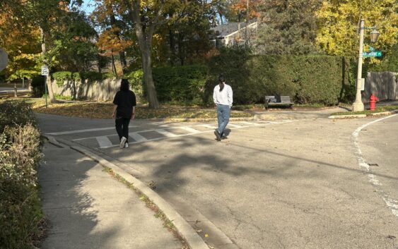 Photo of two people walking seperate ways