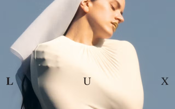 LUX Album cover, featuring Rosalia dressed in a white nun's habit